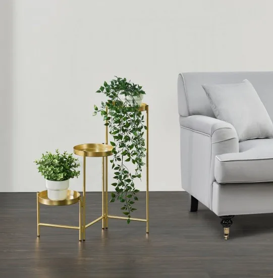 Kallo metal plant stand with three brass-colored trays