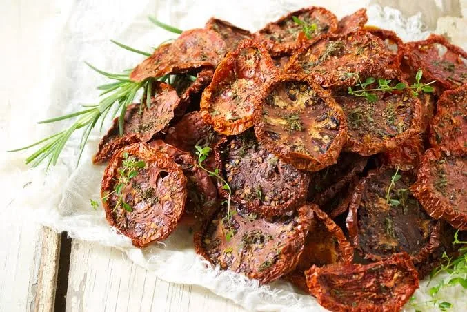 Dried tomatoes with rosemary and olive oil in Spanish style